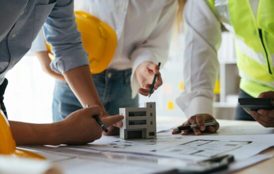 Engineers working together on a building project.